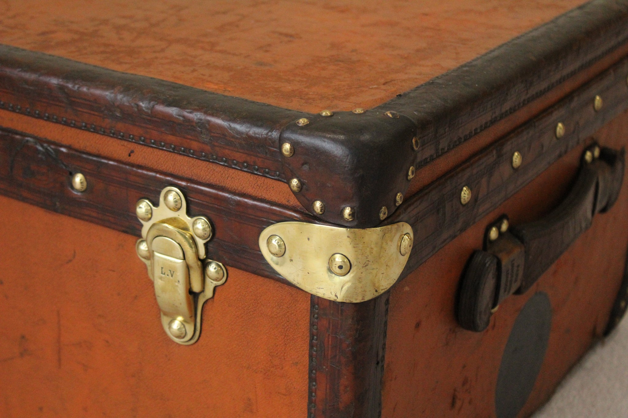 A leather bound 'Osilite' trunk by H.J. Cave & Sons, inscribed for